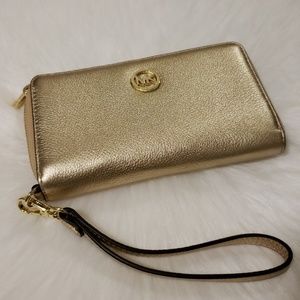 Michael Kors platinum gold wristlet/wallet